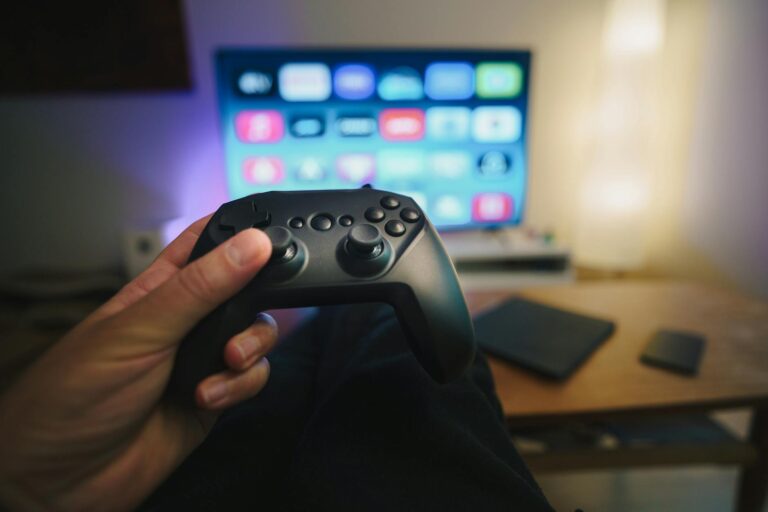 Game console equipment, game pad. TV screen.