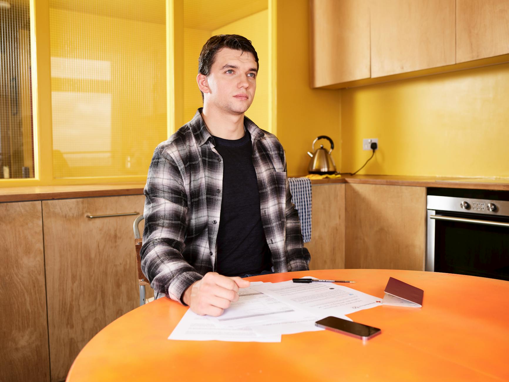 A Man Sitting at a Table