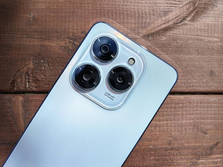 High-Resolution Smartphone Camera on Wooden Surface